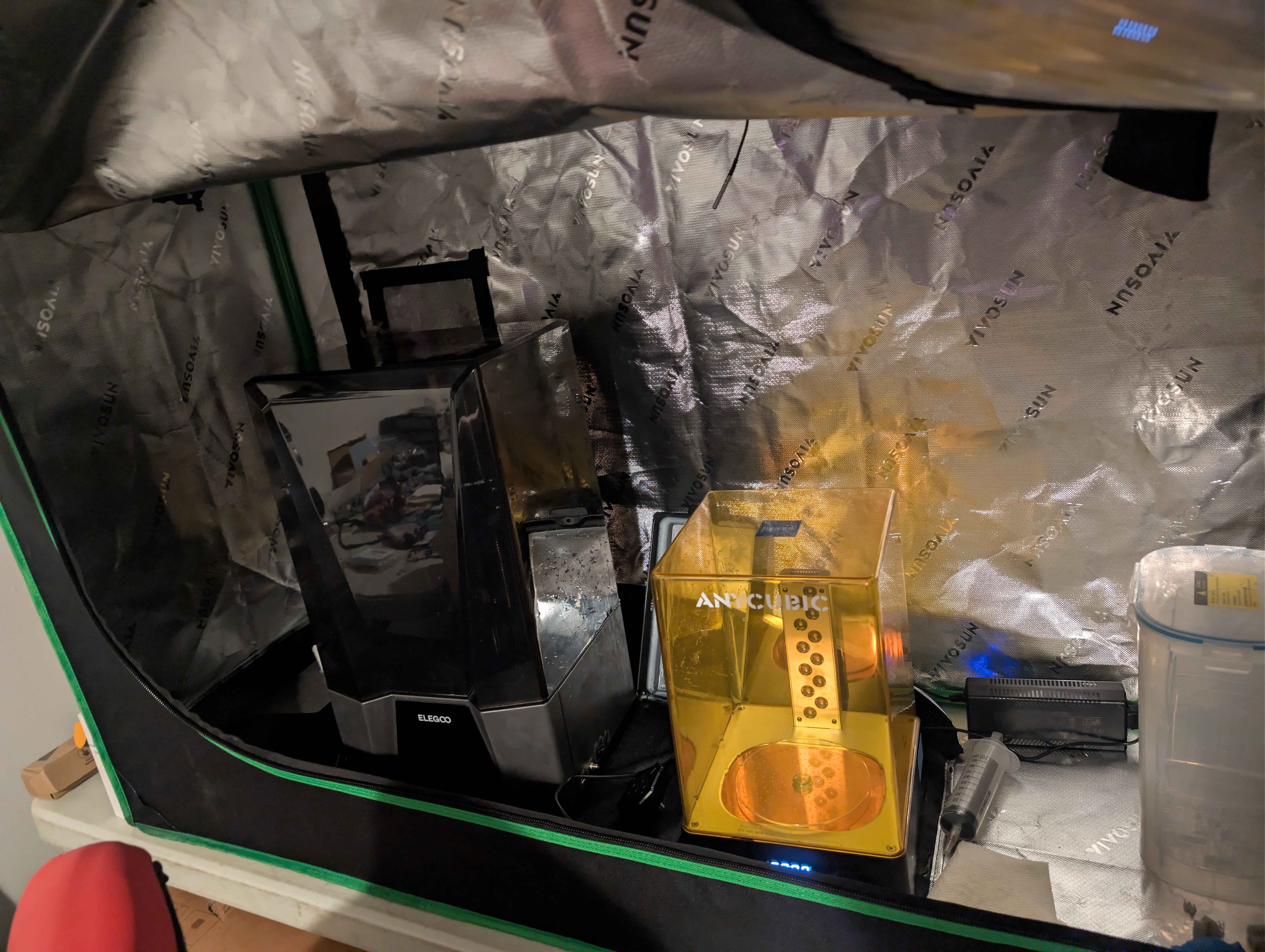 Elegoo Saturn 3 Ultra Printer with a Curing Station inside of a makeshift fume hood.